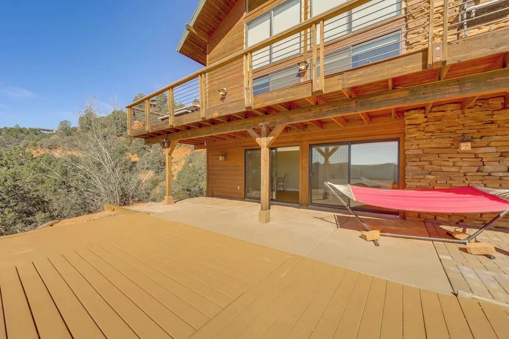 Pine Cabin w/ Wraparound Deck: 2 Mi to Trails