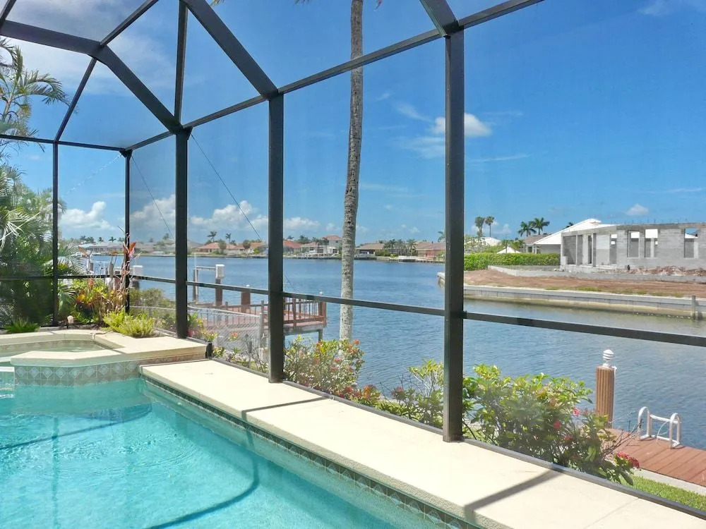 Elegantly decorated waterfront home with pool and spa