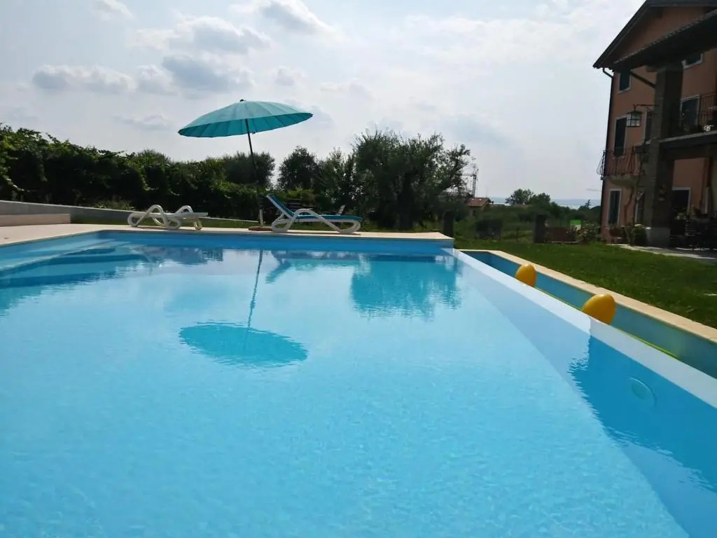 Residence Tasso Canossa - appartamento con piscina