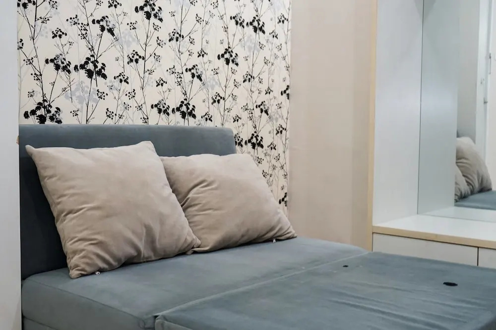 Homey 1BR with City View at Green Pramuka Apartment By Travelio