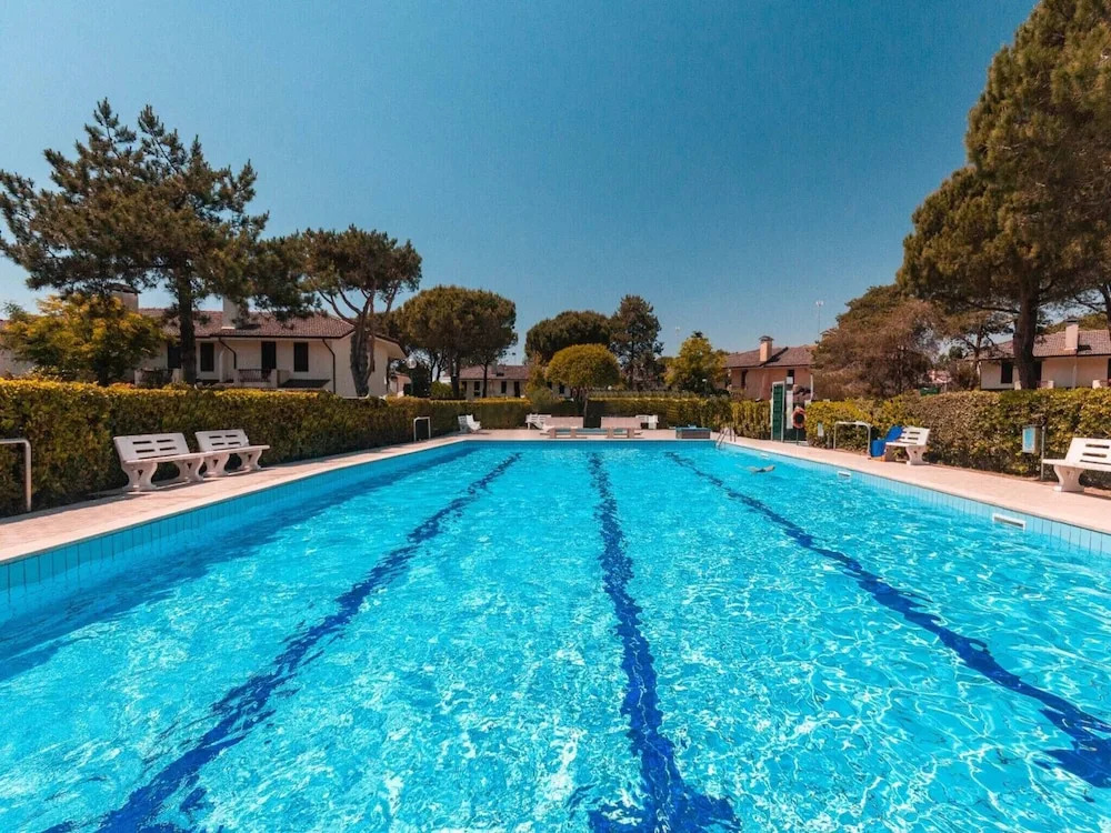 Colorful House With Pool and Garden