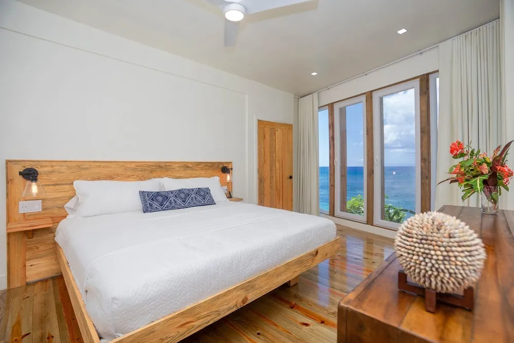 Awesome Over The Water Overlooking West End - Aire Agua 3 Bedroom Home by RedAwning