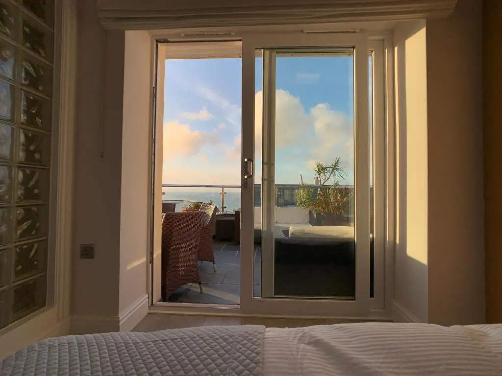 SEA BEACH & COASTAL VIEWS from LRG SUN TERRACE G Bay Apartments OVERLOOKS FISTRAL BEACH MOST DESIRABLE LOCATION SLEEPS & DINES 6 which includes SOFABED 2 BATHROOMS AL FRESCO Dining Smart tv all rooms PRIVATE PARKING 2 CARS sat-sat only April-Nov please