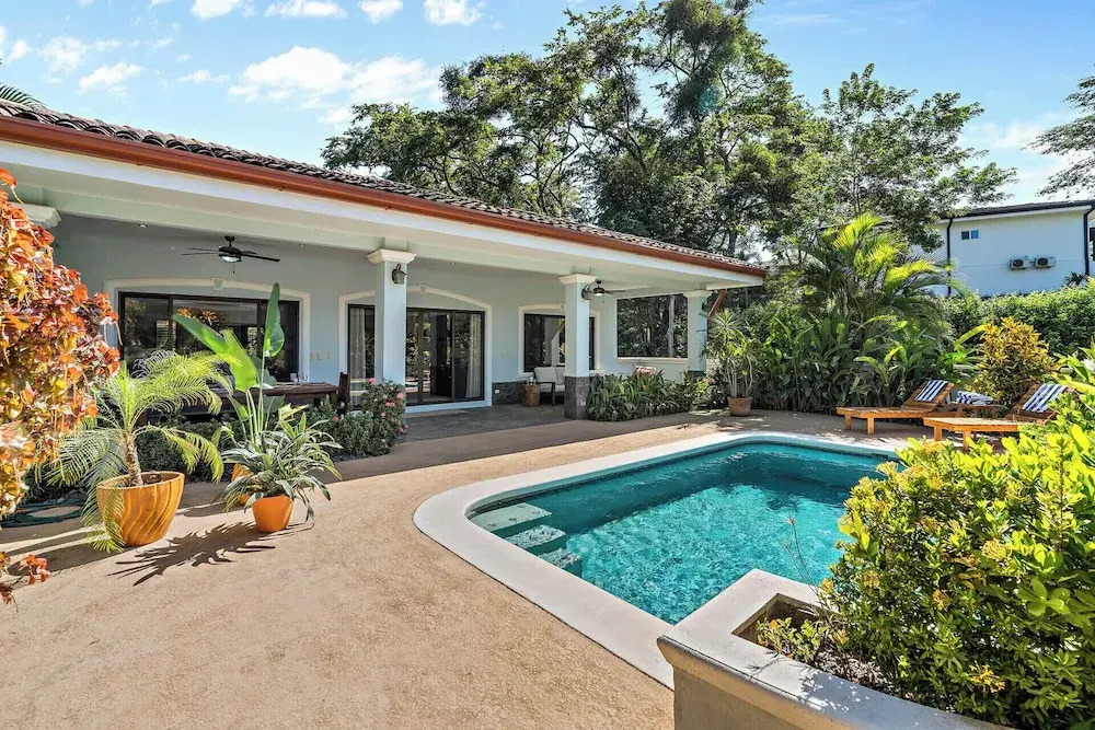 Stylish Home with Chic Decor, Luxury Amenities & Tropical Outdoor Oasis with Sparkling Private Pool