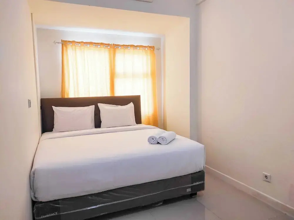 Luxurious 1BR at Vida View Makassar Apartment By Travelio