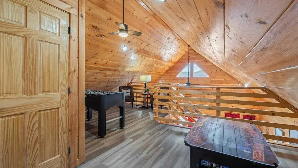 Hot Tub, Game Loft, Open Living, Minutes to Downtown Gatlinburg Whisper Cabin by Avantstay
