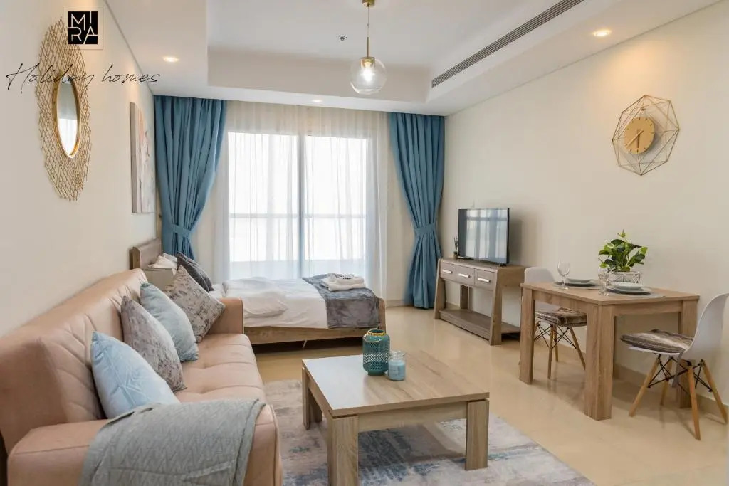 Mira Holiday Homes - Beautiful Studio - WIFI&Pool -7 min to Global Village