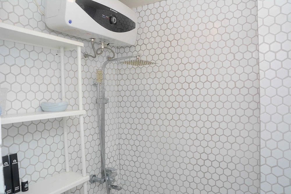 Best Studio Room with Wall Bed Tifolia Apartment