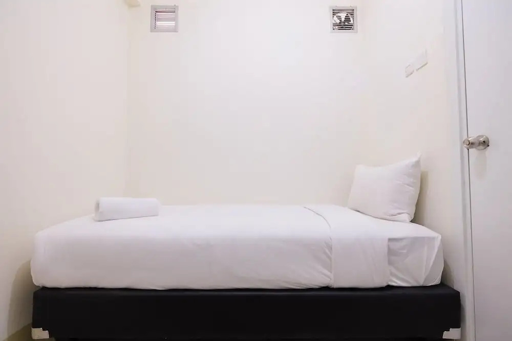 2BR Yotayori Home at Green Pramuka City Apartment By Travelio