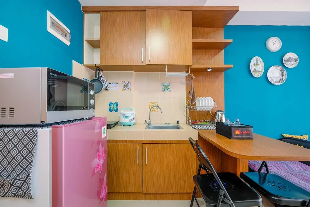 Homey and Comfortable 1BR Apartment at Royal Olive Residence