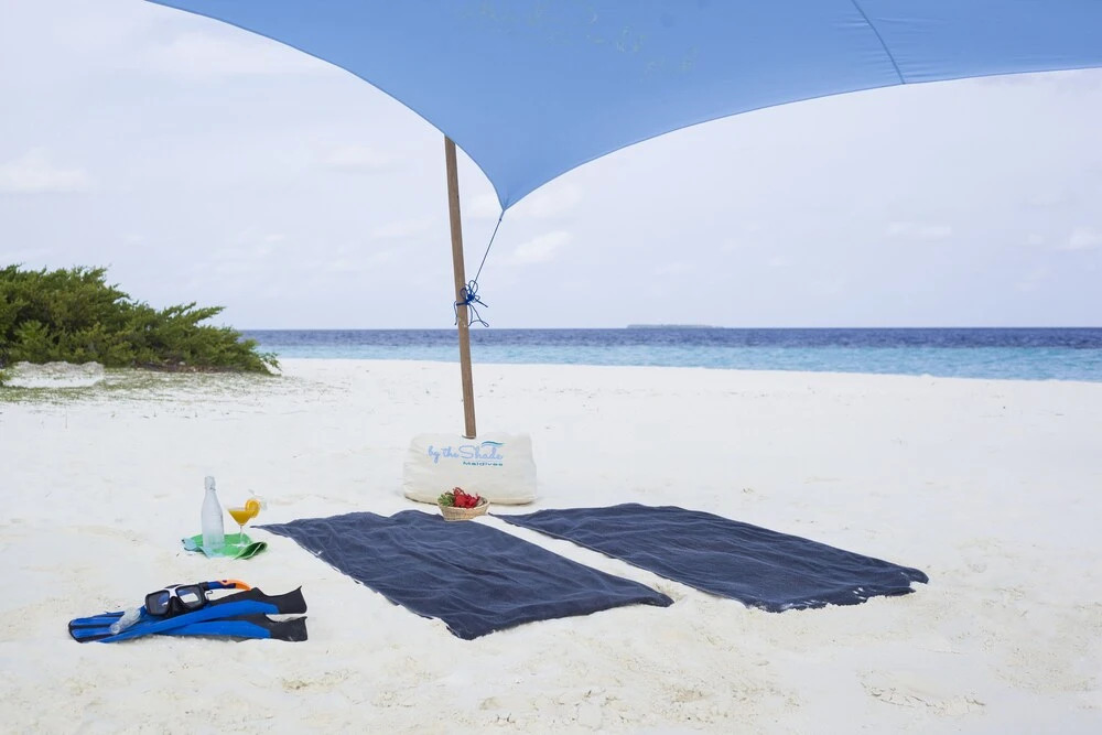 By the shade Maldives