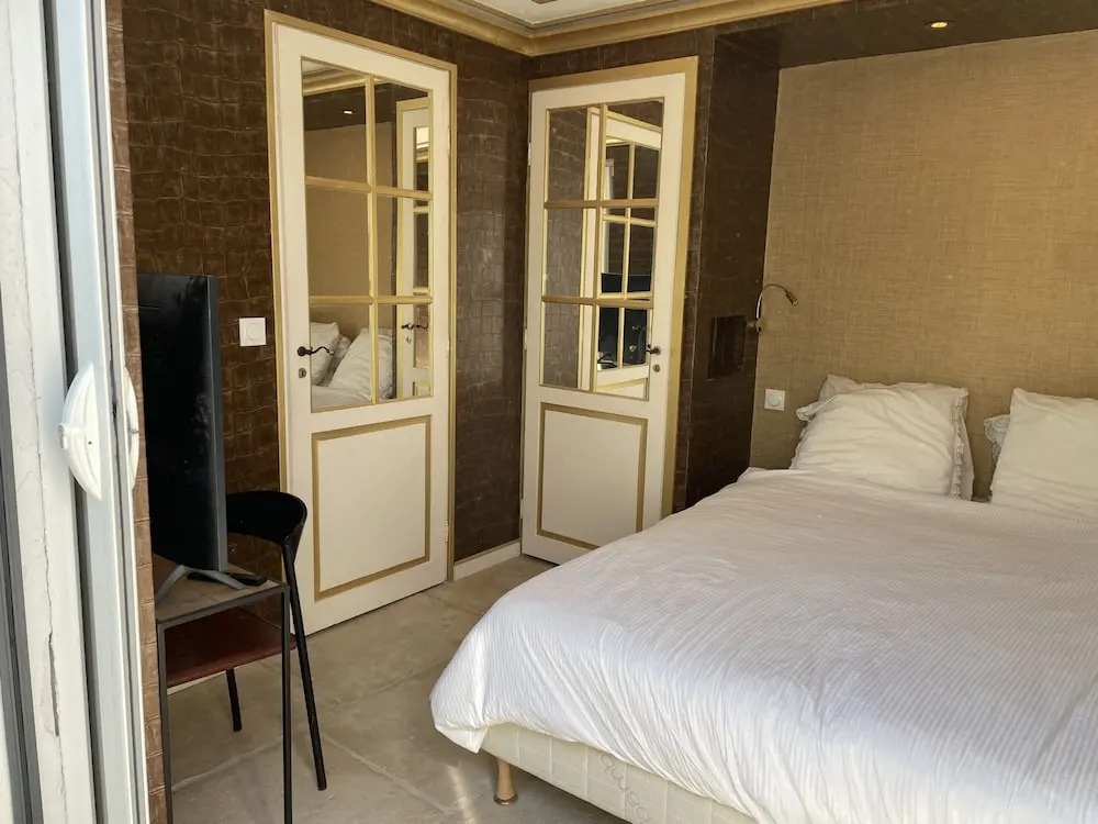 Chambre Luxe Piscine Jardin vue Solarium Palmeraie