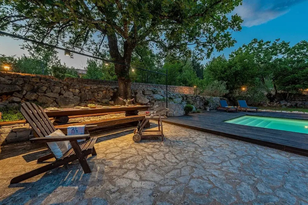 Stone house M&A with pool