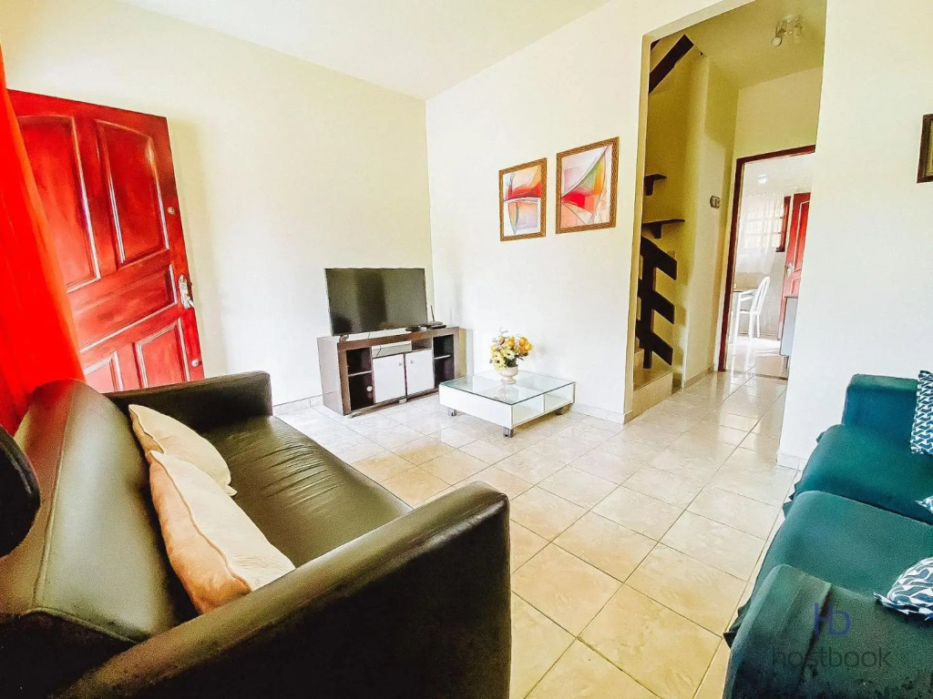 Casa a 300 metros da praia do Centro - WIFI 200MB - Netflix - 2 Quartos - Cozinha equipada - Churrasqueira - Pet friendly - Quintal