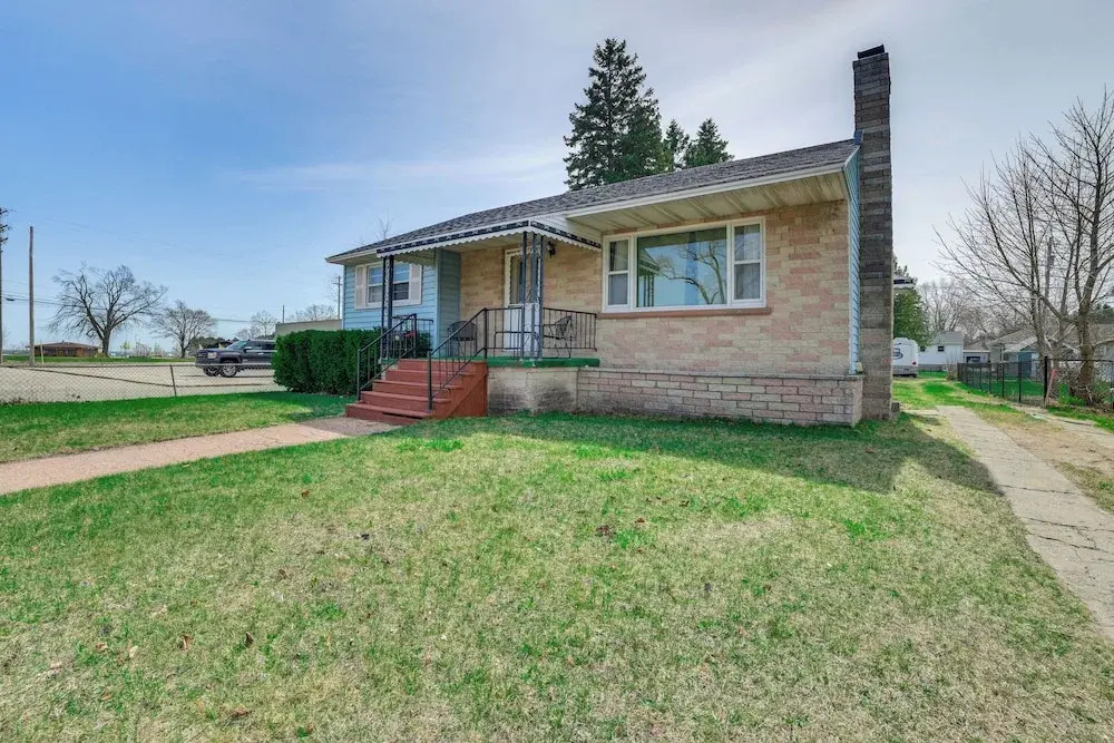 1 MI to Marina: Alpena Lake View Home!