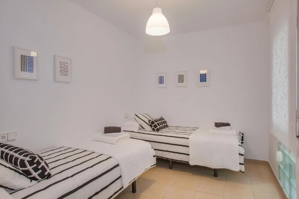 Lets Holidays White Apartment with Terrace, AC & Parking, Near Beach