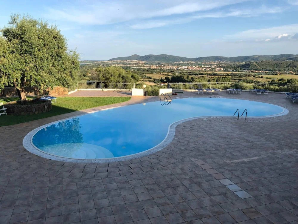 Apartment With one Bedroom in Provincia di Olbia-tempio, With Wonderful sea View, Shared Pool and Balcony - 2 km From the Beach