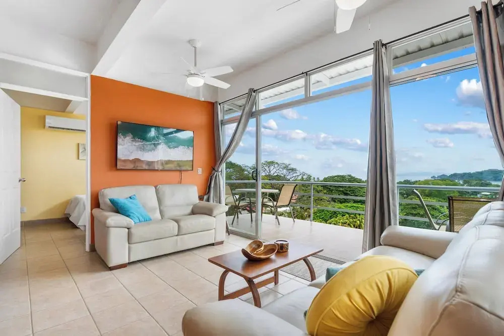 Modern Top-Floor Condo with Panoramic Views and Community Pool