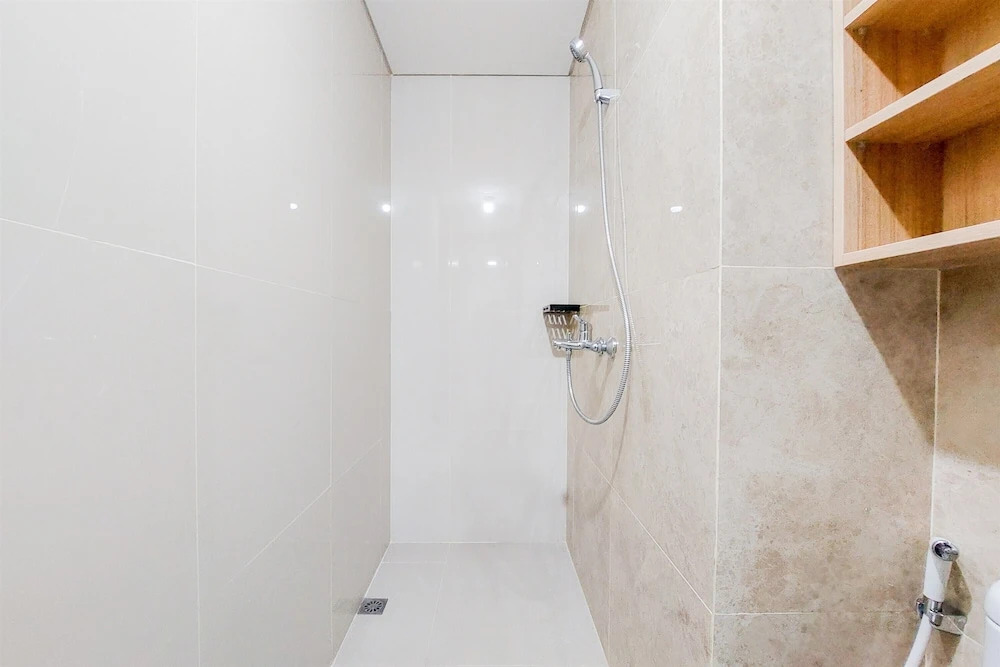 Comfort 1BR at Transpark Bintaro Apartment By Travelio