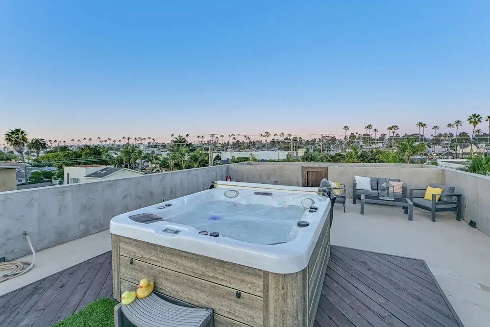 Stroll to Shore: Oceanside Condo w/ Hot Tub Access