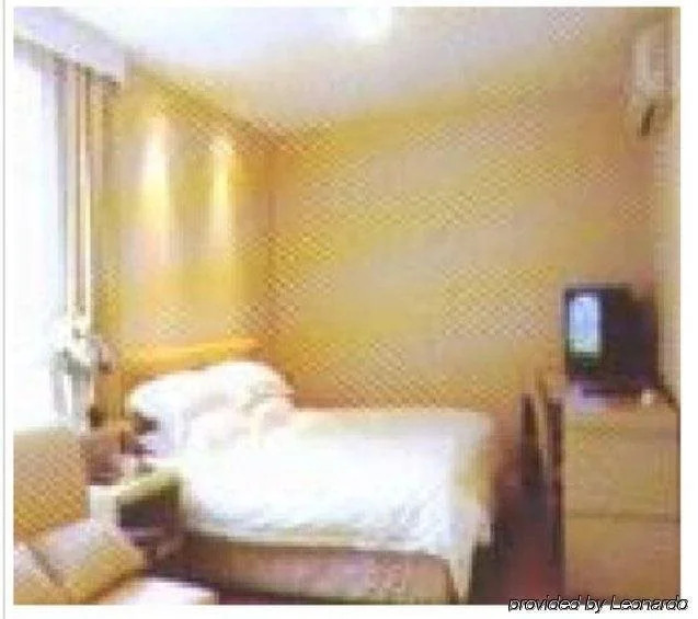 Baolong Homelike Hotel (Wujiaochang Branch)