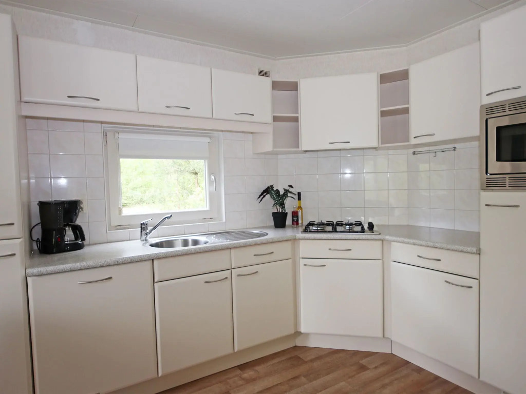 Nice chalet with dishwasher surrounded by greenery