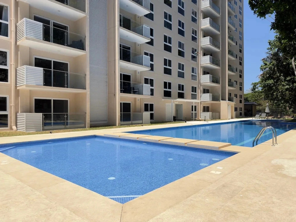 Ocean View Condo Steps to Beach & Comfort