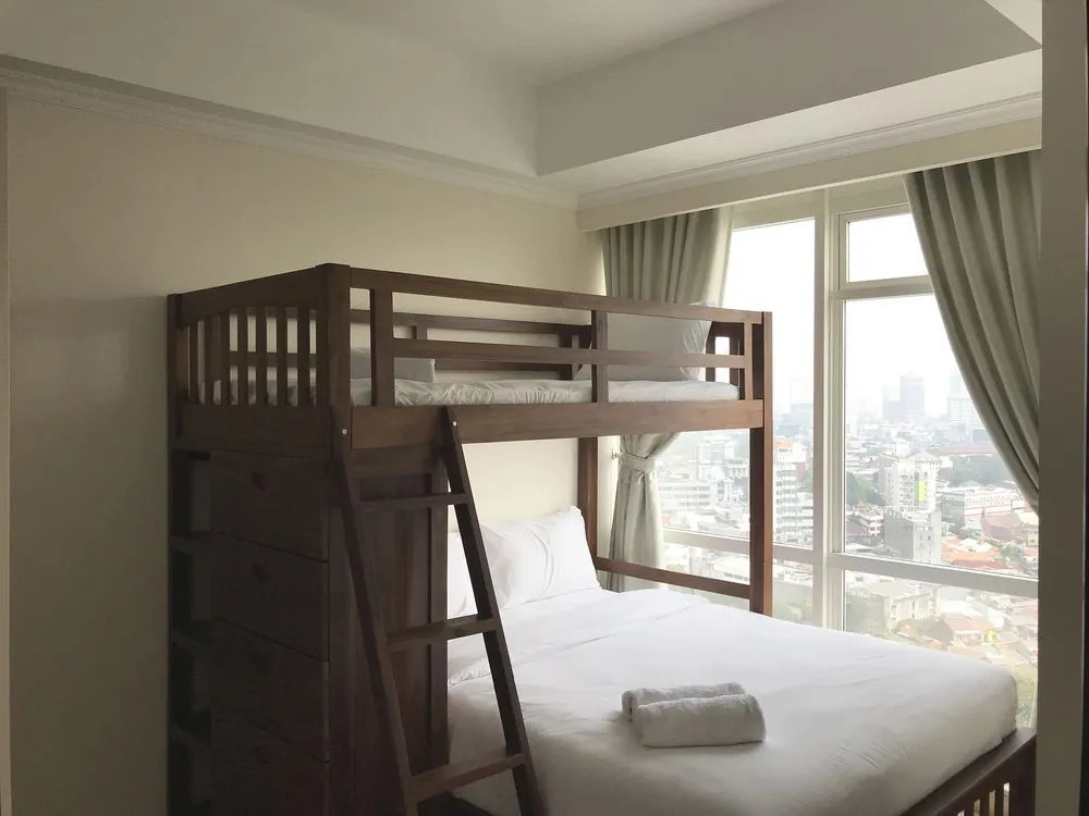 Luminous 2 Bedrooms at Menteng Park Apartment by Travelio