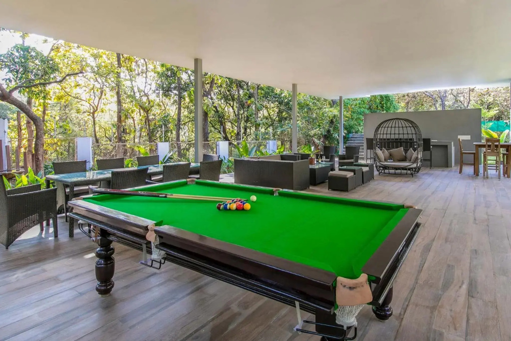 Reflection House by StayVista with Pool, Terrace bar, Indoor games & Exquisite interiors in a nutshell