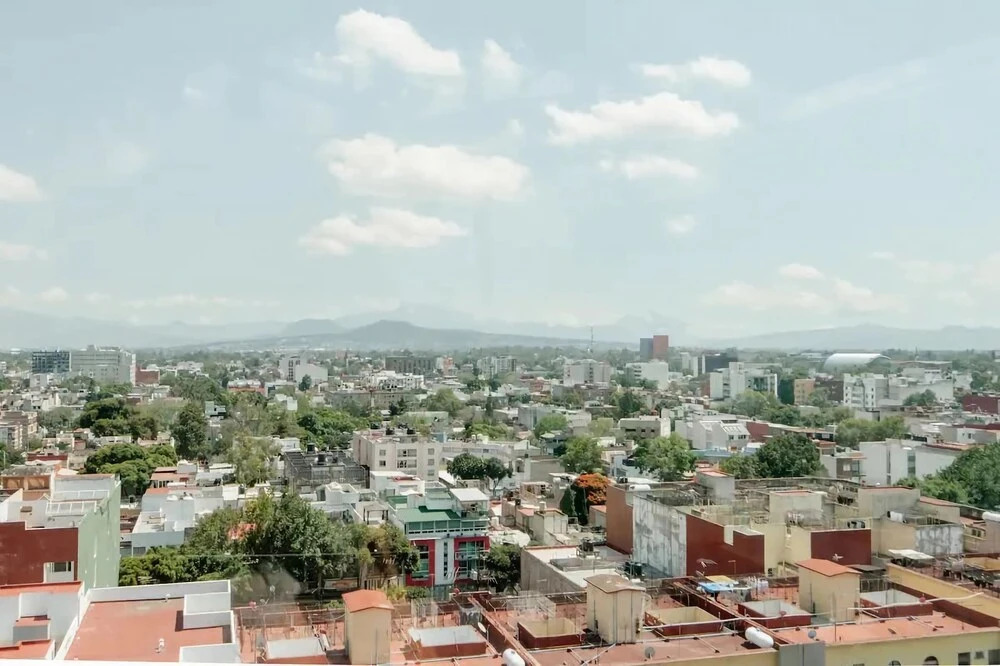 Bed in mixed room near Coyoacan