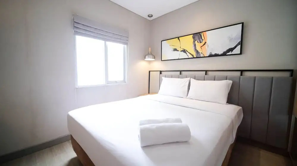 Minimalist and Beautiful 1BR with Extra Room at Pavilion Permata Apartment By Travelio