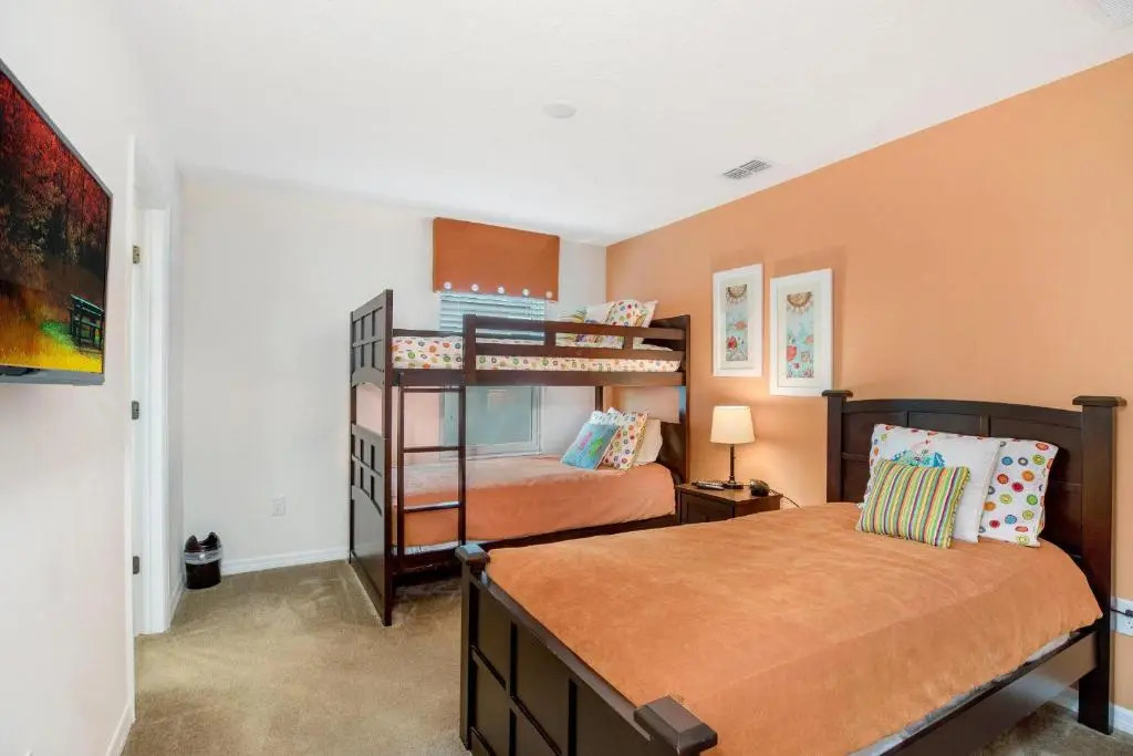 Spacious 6-Bedroom Getaway with Game Room, Private Spa & Sunny Pool Deck in Premier Resort Setting
