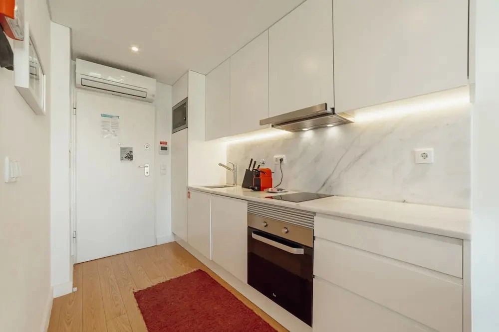 Downtown Bright Balcony Apartment by Vacationy