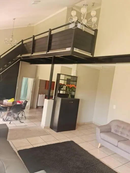 Justin's Place Lounge. An Exceptional Home with no Load Shedding, by The Grove Mall and Wilgers Hospital.