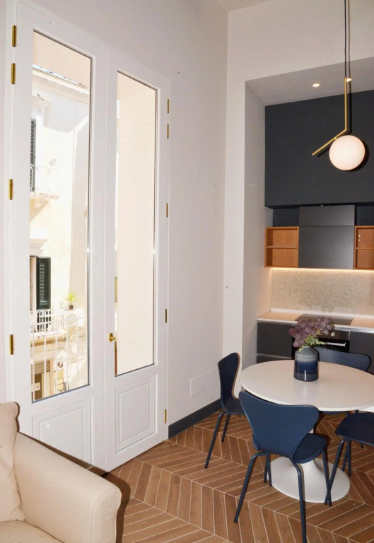 Apartment suitable for families or couples, equipped kitchen and laundry corner, private balcony-Mattia by Dimore Garibaldi