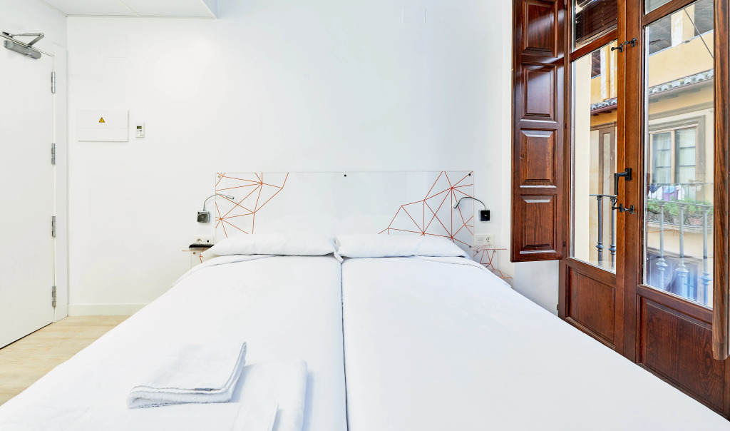 AMC Granada Hostal