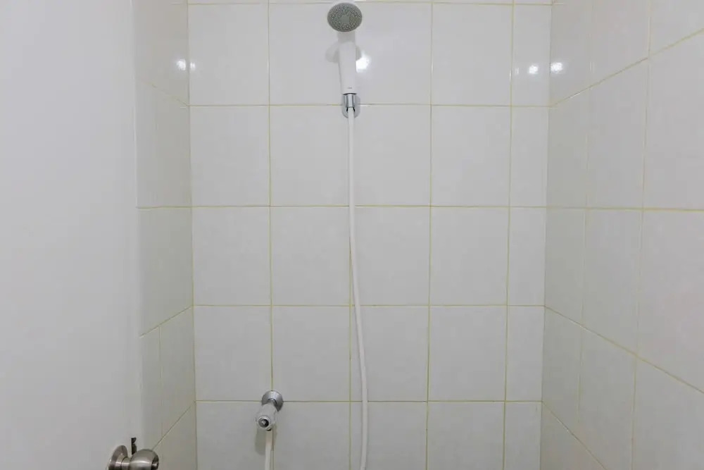 Simple Studio Room at Poris 88 Apartment
