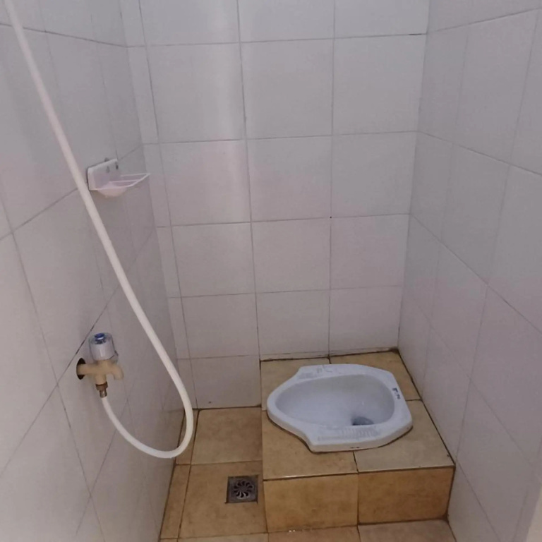 Spot On 3988 Kost Carmelia Baranangsiang Syariah