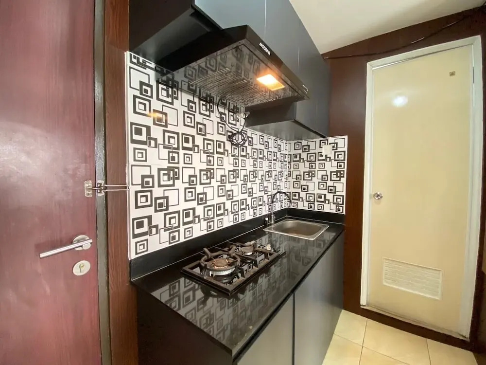 Comfy & Well Appointed 2BR at Tamansari Panoramic Apartment
