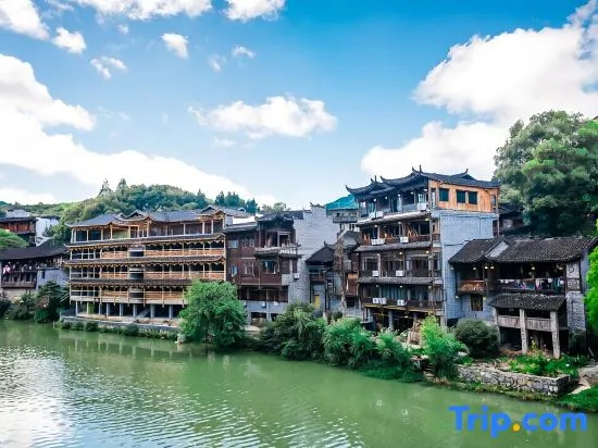 Huaqianshu Theme Inn 高铁免费接站或送站一次