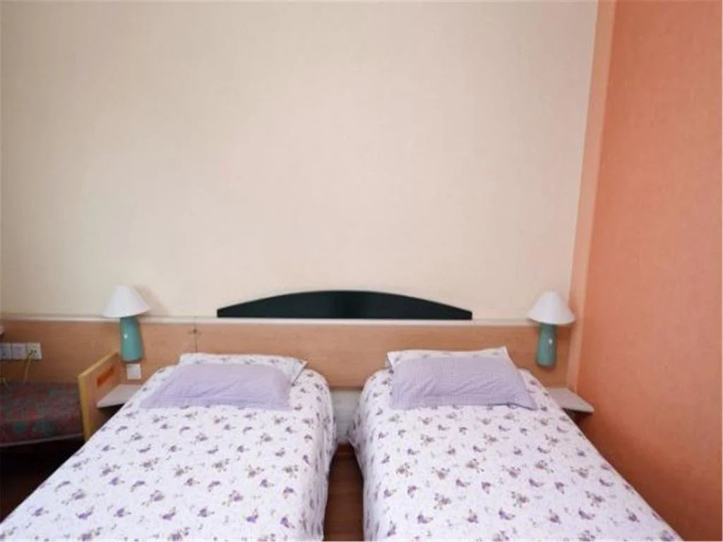 Motel Qingdao Licang Square