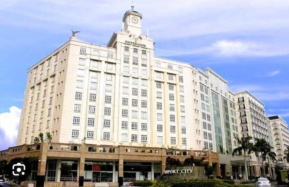 Henry & Adiche  Emperador Building