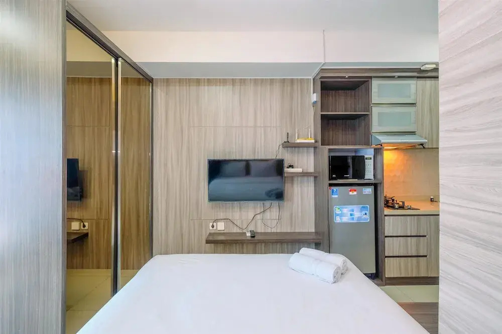 Comfort and Best Deal Studio at Grand Kamala Lagoon Apartment By Travelio