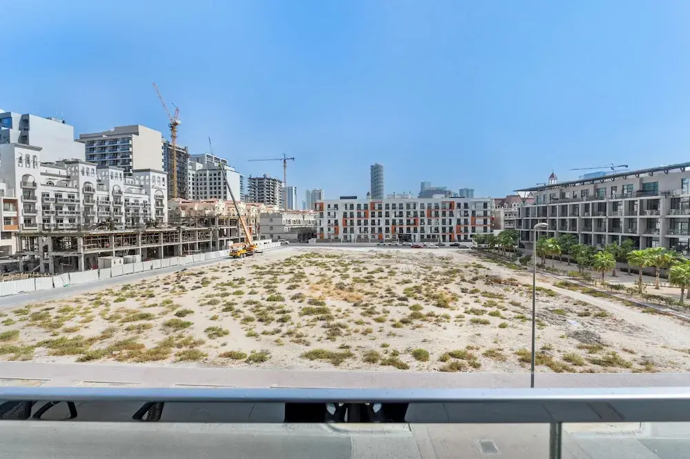 Waves - Stylish 1BR in JVC with Balcony & Pool