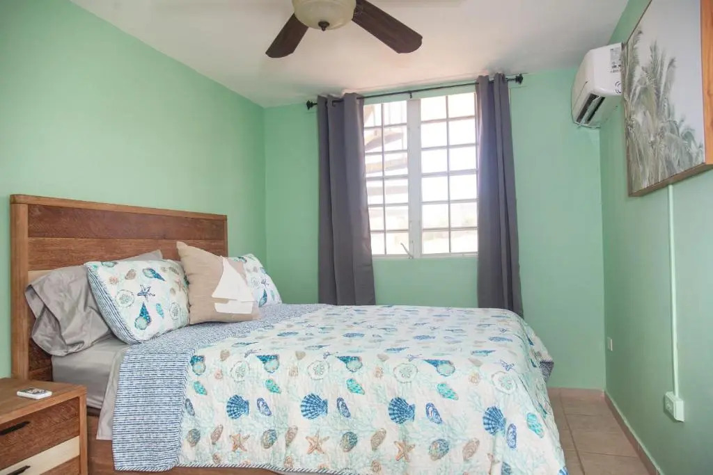 Two bedroom villa Penthouse, rooftop terrace steps from Sandy Beach PRV 301Sandy Beach and the west