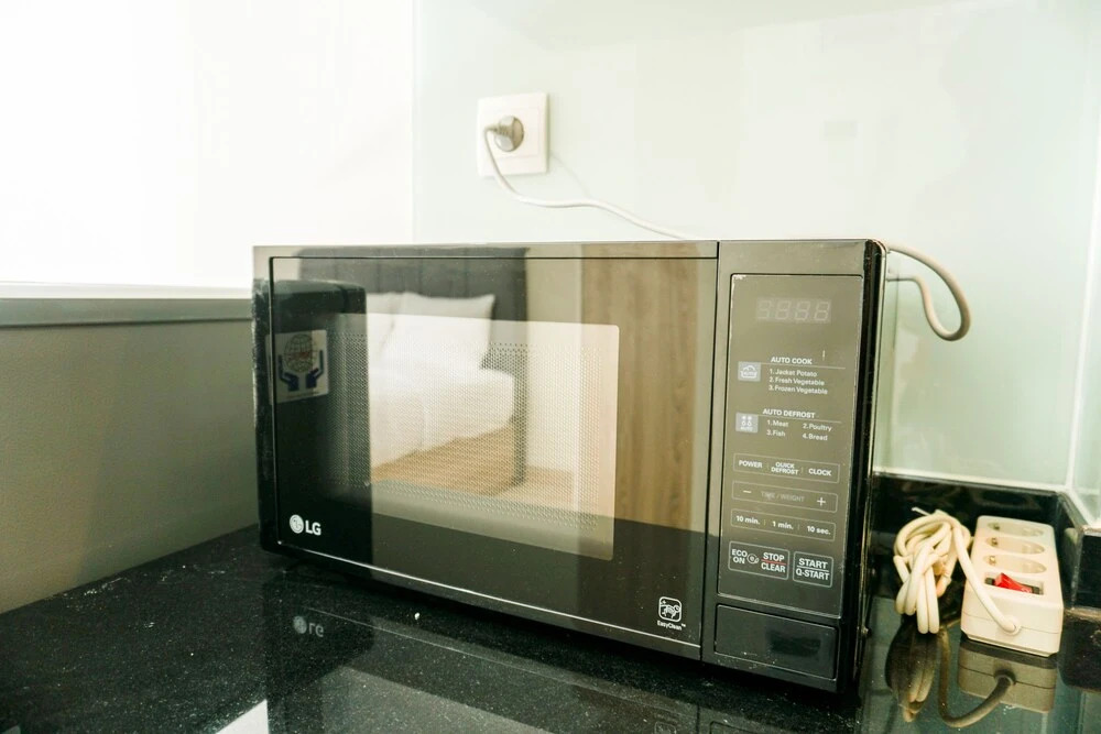 Fully Furnished with Cozy Design Studio at Menteng Park Apartment By Travelio
