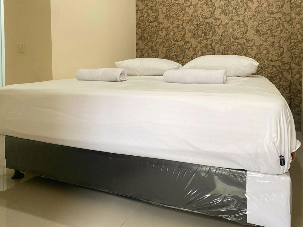 CK Homestay Syariah near Lippo Plaza Jambi Mitra RedDoorz