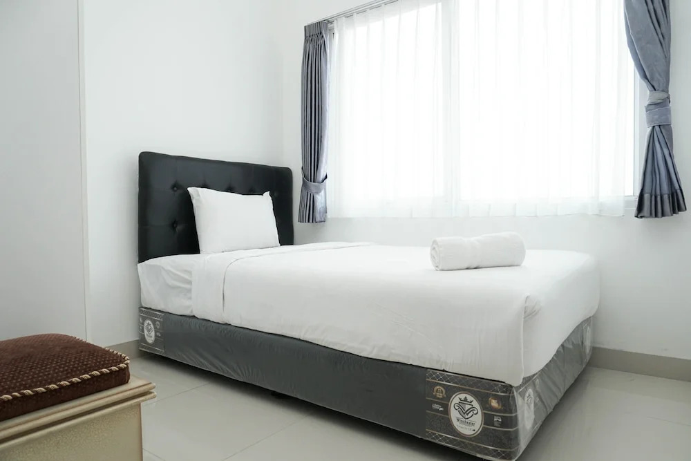 Minimalist And Cozy 2Br Apartment At The Nest Near Puri By Travelio