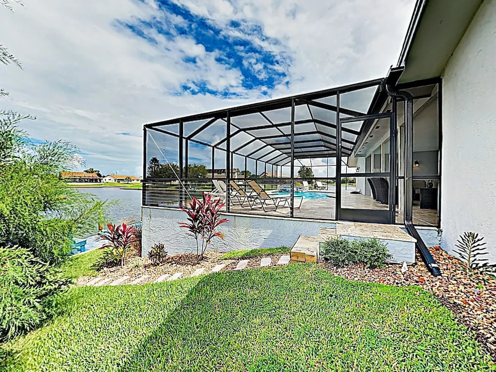 Waterfront W/ Stunning Views, Pool, Boat Dock 4 Bedroom Home