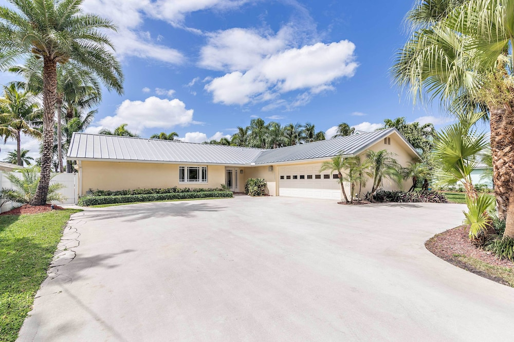 Sunny Waterfront Home by West Palm w/ Hot Tub!